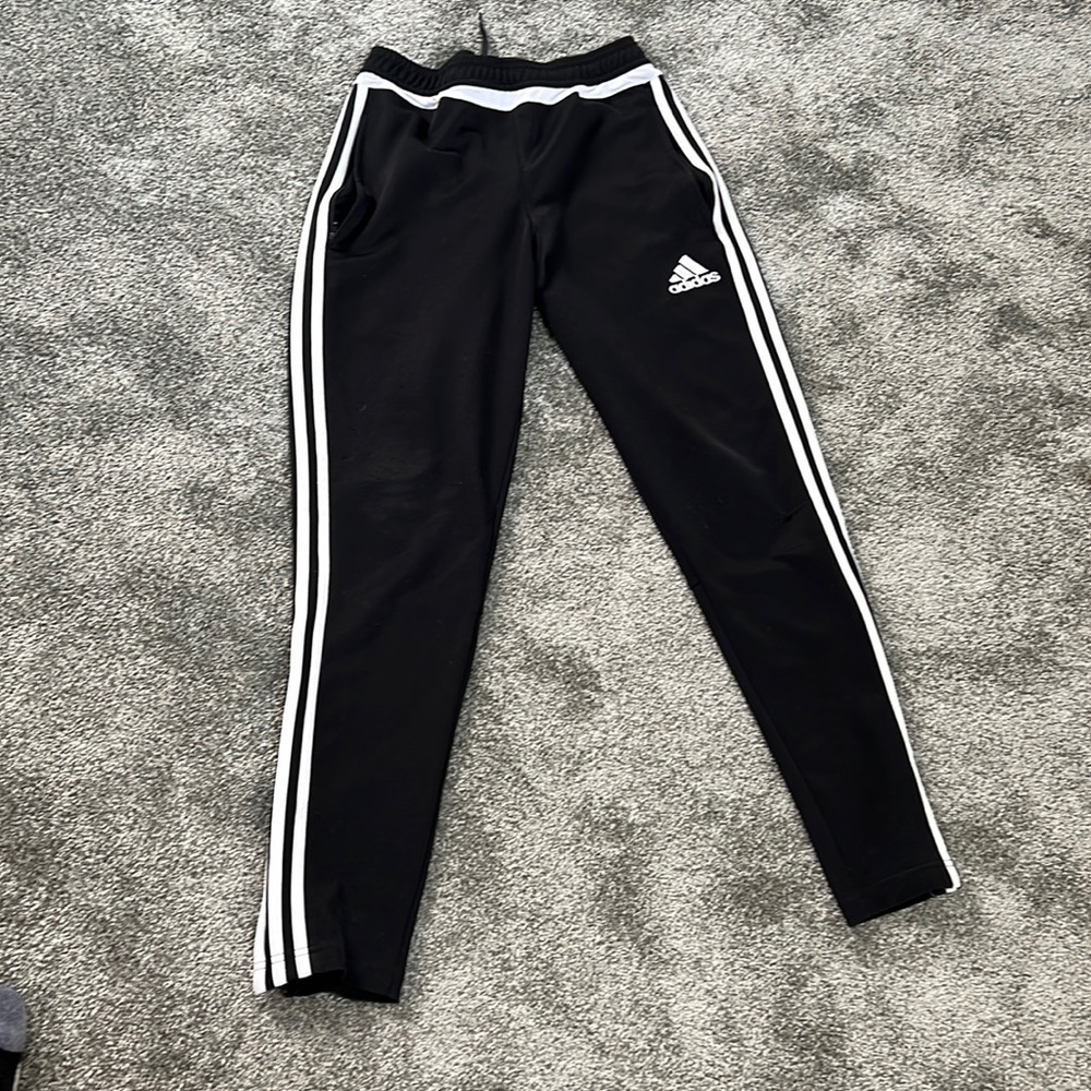 Black Adiidas sweatpants in good condition.